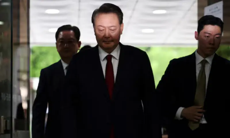 Former South Korean President Yoon Suk Yeol arrives at a court to attend a hearing to review his arrest warrant requested by special prosecutors in Seoul, South Korea. -- Reuters