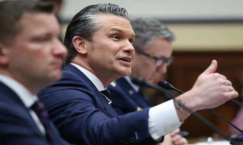 US Secretary of Defence Pete Hegseth (centre) and General Dan Caine, Chairman of the Joint Chiefs of Staff, Department of Defence (right), appear for testimony before the House Armed Services Committee on April 29, 2026 in the Rayburn House Office Building in Washington, DC. Also pictured is Jules Hurst, Undersecretary of Defence (left). AFP