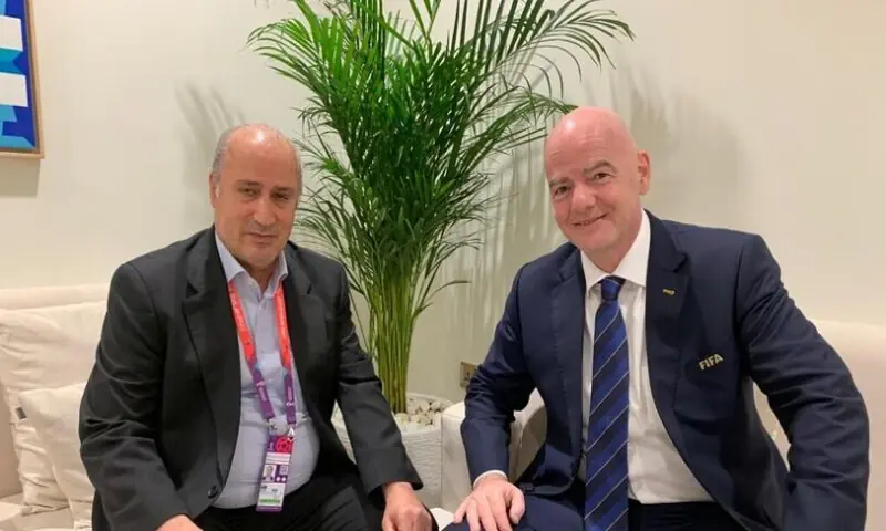 Iranian football federation president Mehdi Taj, left, alongside president of Fifa Gianni Infantino. -- Social media
