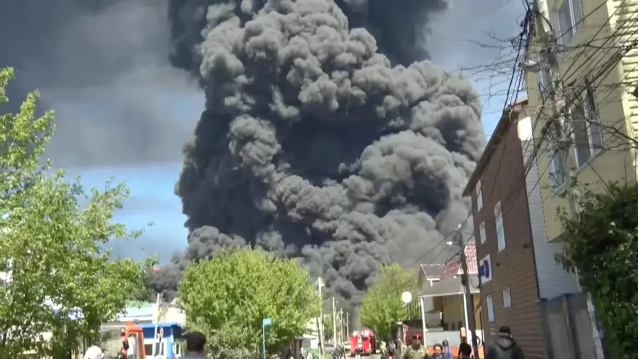 Heavy smoke rises above the area during a visit by Krasnodar region's Governor Veniamin Kondratyev, who inspects emergency services following a Ukrainian drone attack that caused a fire at an oil refinery, amid the Russia-Ukraine conflict, in Tuapse, Russia. -- Reuters