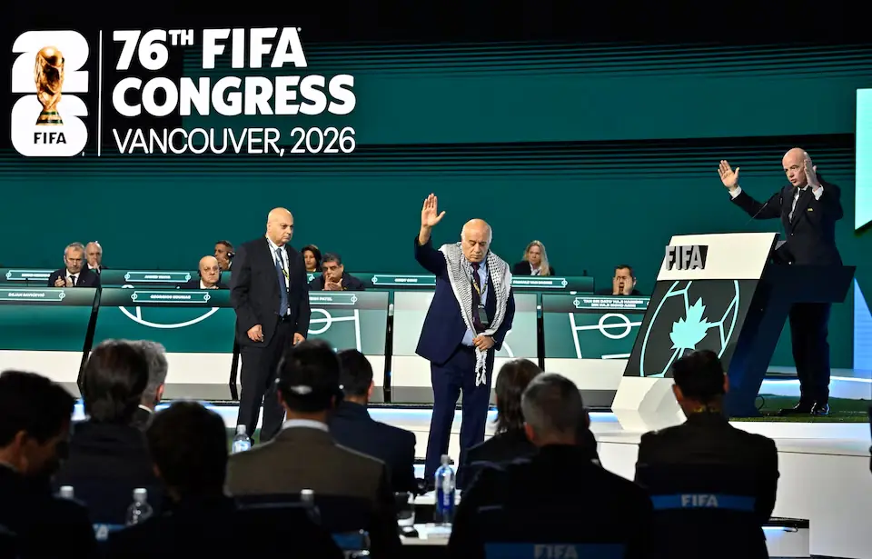 The President of the Palestine Football Association, Moshe Zuares, the President of the Israeli football federation and FIFA President Gianni Infantino. -- Reuters