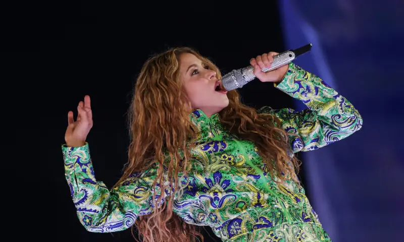 Shakira performs during an open concert at the Copacabana beach in Rio de Janeiro, Brazil. -- Reuters