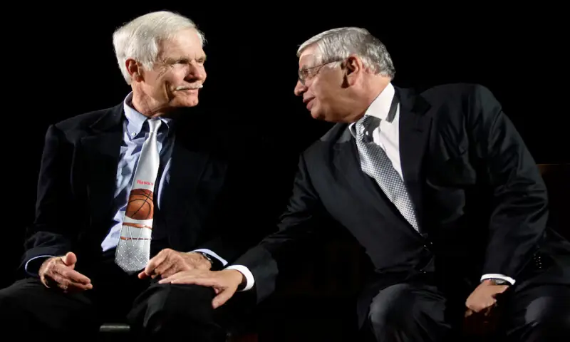 NBA commissioner David Stern talks to Ted Turner. -- Reuters file