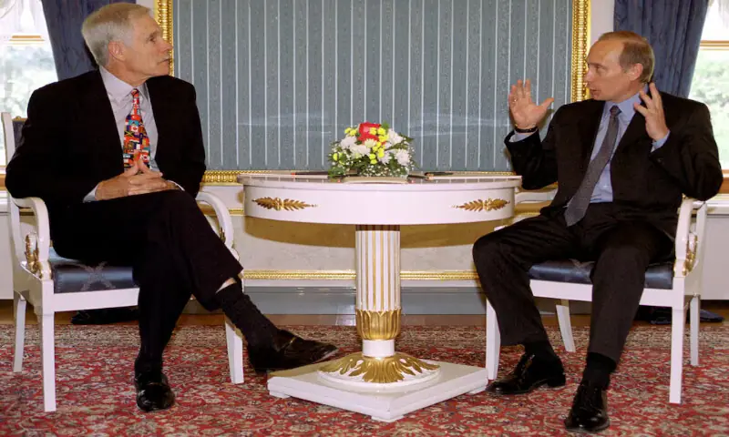 Russian President Vladimir Putin gestures during a meeting with Ted Turner in Moscow, Russia, on May 11, 2000. -- Reuters