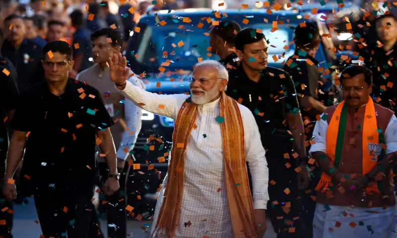India's Prime Minister Narendra Modi greets his supporters as he arrives at the Bharatiya Janata Party (BJP) headquarters as the BJP won the Assam state assembly election and was on course to win West Bengal, in New Delhi, India, on May 4, 2026. Reuters file