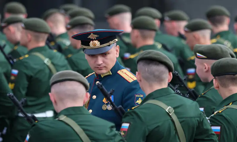 Russian service members line up before a military parade on Victory Day in central Moscow, Russia, on Saturday. -- Reuters