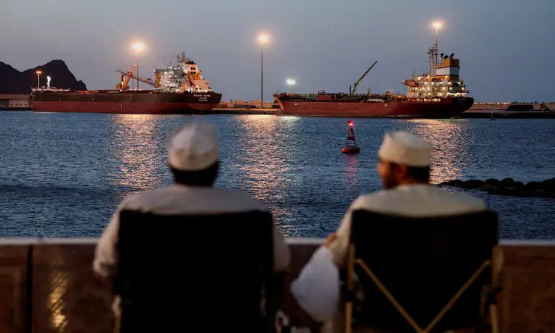 The Galaxy Globe bulk carrier and the Luojiashan tanker sit anchored in Muscat, Oman. -- Reuters