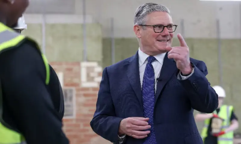 Britain's Prime Minister Keir Starmer meets construction apprentices during a visit to London South Bank Technical College in London, Britain. -- Reuters
