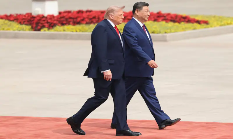 Chinese President Xi Jinping walks with US President Donald Trump during a welcome ceremony at the Great Hall of the People in Beijing, China, on Thursday. -- Reuters Chinese President Xi Jinping walks with US President Donald Trump during a welcome ceremony at the Great Hall of the People in Beijing, China, on Thursday. -- Reuters