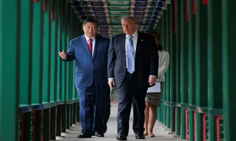 U.S. President Donald Trump participates in a friendship walk through Zhongnanhai Garden with Chinese President Xi Jinping in Beijing, China. -- Reuters