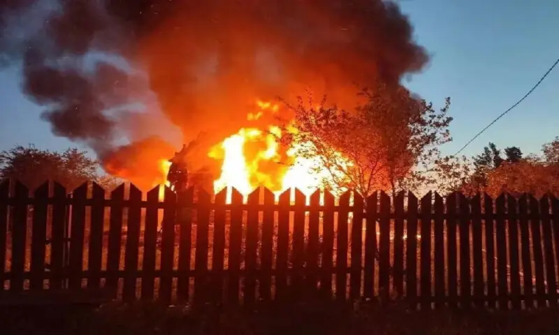 A house is on fire after a Ukrainian drone attack in the village of Subbotino, Naro-Fominsk District, in the Moscow region, on Sunday. -- Reuters