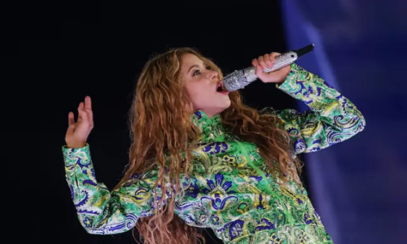 Shakira performs during an open concert at the Copacabana beach in Rio de Janeiro, Brazil. -- Reuters