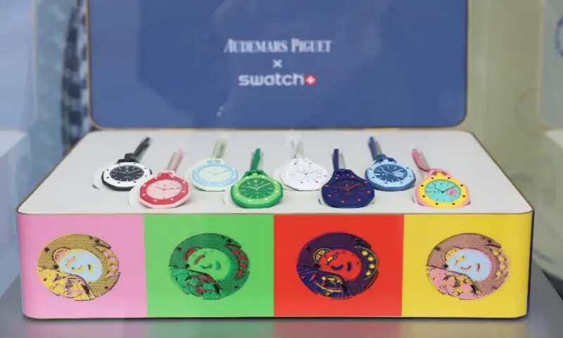 A box of Audemars Piguet and Swatch "Royal Pop" watches is displayed at a Swatch shop in London, Britain. -- Reuters