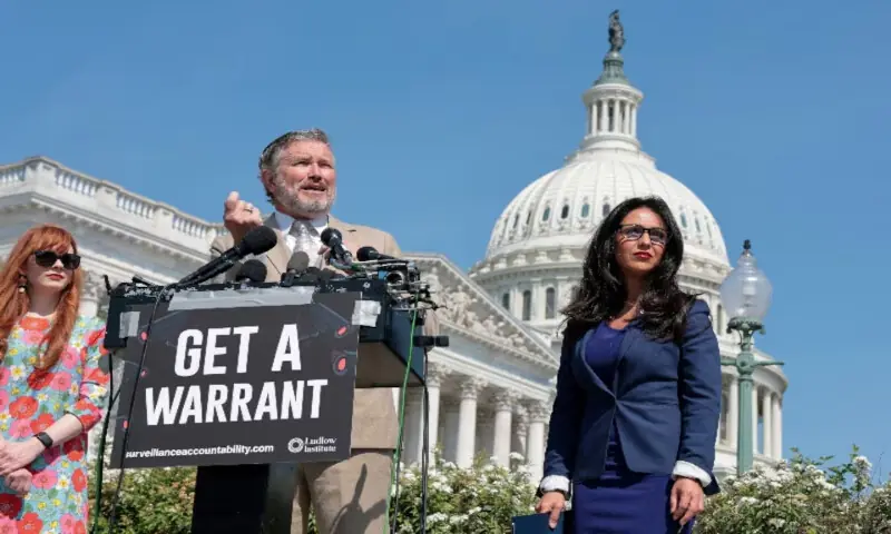 US Representative Thomas Massie (R-KY) and Representative Lauren Boebert (R-CO) hold a news conference to introduce their Surveillance Accountability Act, proposed legislation that would require government agencies to obtain a warrant before conducting surveillance on US citizens, at the US Capitol in Washington, DC, on April 23, 2026. Reuters