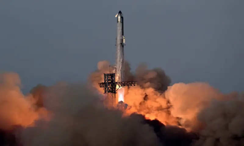 A SpaceX Super Heavy booster carrying the Starship spacecraft lifts off on its 10th test flight at the company's launch pad in Starbase, Texas, US. -- Reuters