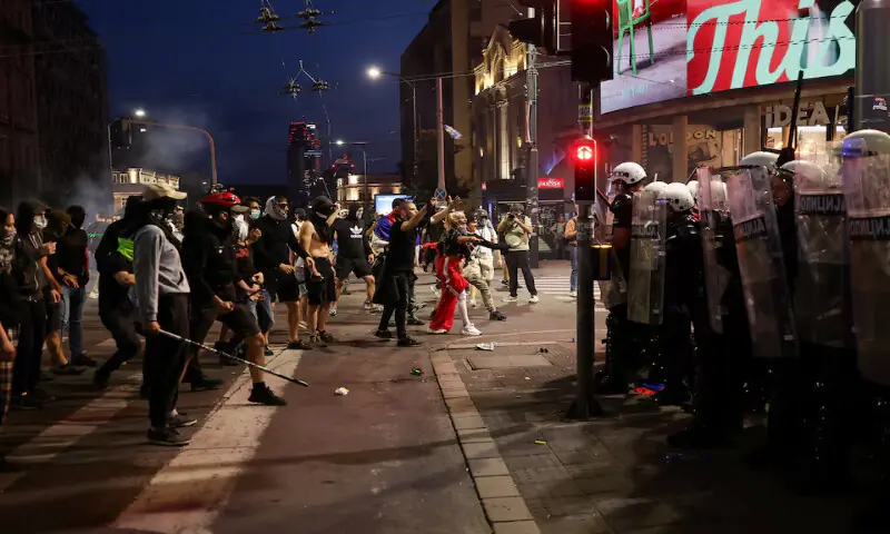 Demonstrators stand in front of riot police, during a student-led protest demanding snap parliamentary elections in Belgrade, Serbia. -- Reuters Demonstrators stand in front of riot police, during a student-led protest demanding snap parliamentary elections in Belgrade, Serbia. -- Reuters