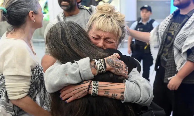 Juliet Lamont, an Australian member of the Gaza-bound Global Sumud Flotilla, which was intercepted by Israeli forces, receives a hug as she arrives at Sydney International Airport, Sydney, Australia. -- Reuters Juliet Lamont, an Australian member of the Gaza-bound Global Sumud Flotilla, which was intercepted by Israeli forces, receives a hug as she arrives at Sydney International Airport, Sydney, Australia. -- Reuters