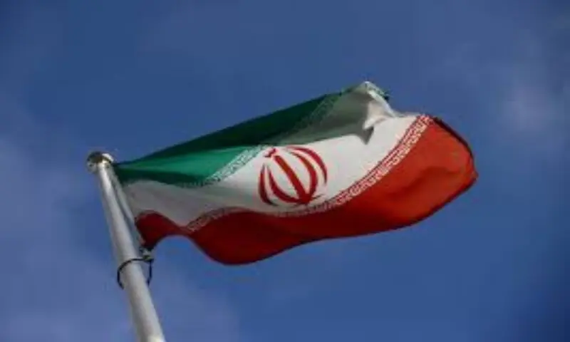 The Iranian flag waves in front of the International Atomic Energy Agency (IAEA) headquarters, before the beginning of a board of governors meeting, in Vienna, Austria. -- Reuters