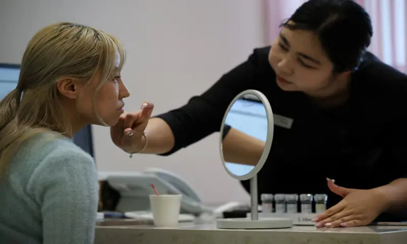 Cindy Gu from the US receives a skin consultation at Lienjang Clinic in Seoul, South Korea. -- Reuters