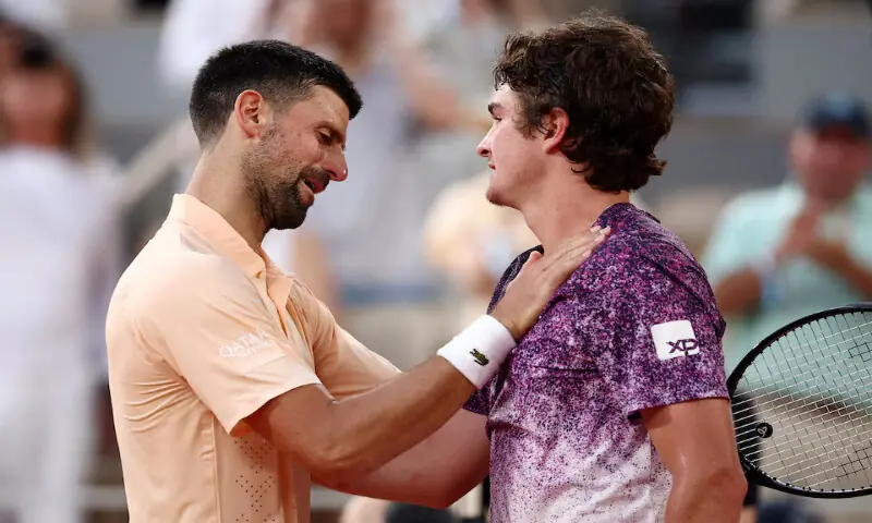 Brazil's Joao Fonseca celebrates winning his third round match against Serbia's Novak Djokovic at the French Open. -- Reuters