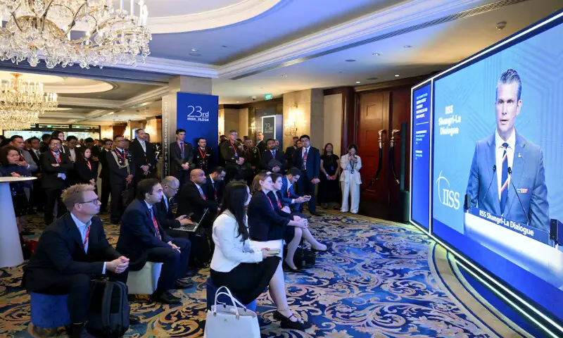 Delegates view US Secretary of Defence Pete Hegseth's speech on a screen at the Shangri-La Dialogue security summit in Singapore on May 30, 2026. Reuters