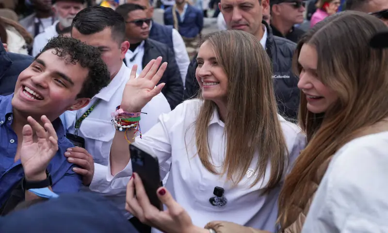 Colombian presidential candidate Paloma Valencia greets supporters after voting at a polling station during the first round of the presidential election in Bogota. -- Reuters