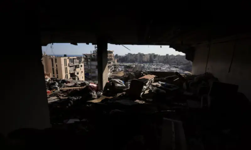 People's belongings lie scattered at the site of an Israeli strike on an apartment in Gaza City. -- Reuters