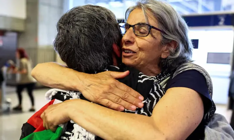 French activists from the Gaza-bound Global Sumud Flotilla, detained by Israeli forces after their vessels were intercepted in international waters in the Mediterranean, arrive at Charles de Gaulle Airport, in Roissy-en-France, near Paris, France. -- Reuters