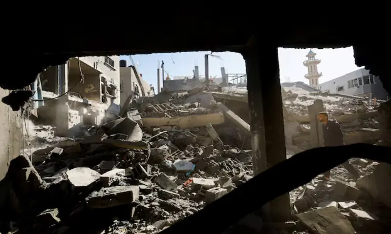 A Palestinian man inspects the site of an Israeli strike on a house whose residents were warned to evacuate before the attack, in Zawayda, central Gaza Strip on June 5, 2026. Reuters