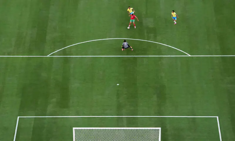 [3/6] Soccer Football - FIFA World Cup 2026 - Group C - Brazil v Morocco - New York/New Jersey Stadium, East Rutherford, New Jersey, U.S. - June 13, 2026 Morocco's Ismael Saibari scores their first goal past Brazil's Alisson Becker. -- Reuters