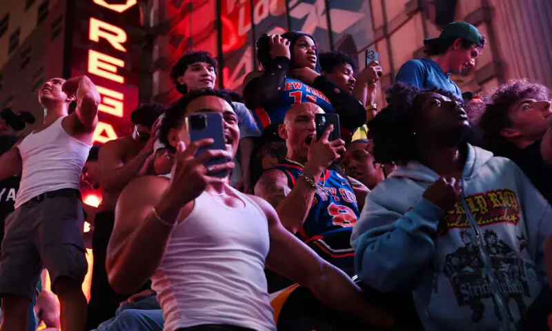 Fans gather along 42nd Street in Times Square in New York City, US. -- Reuters