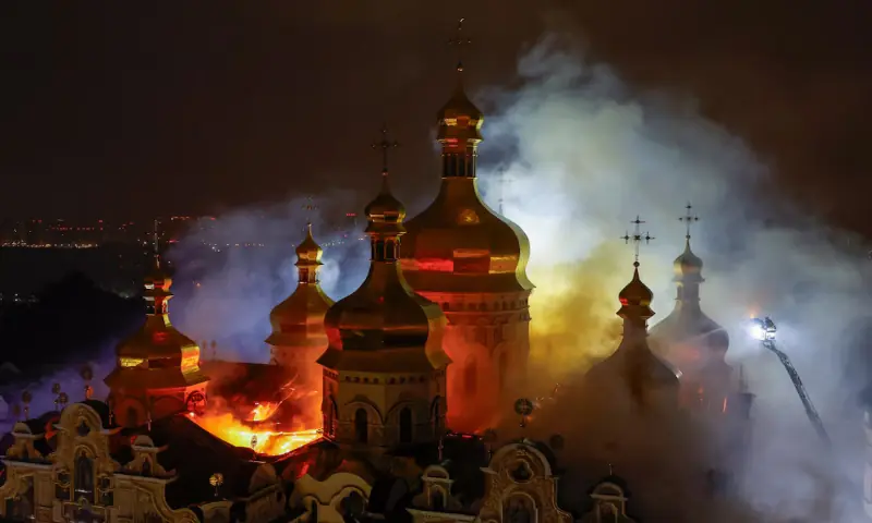 Firefighters work to extinguish a fire at the Dormition Cathedral of the Kyiv Pechersk Lavra, which was hit during Russian missile and drone strikes, amid Russia's attack on Ukraine, in Kyiv, Ukraine. -- Reuters