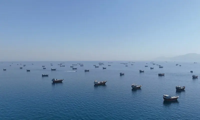Vessels in the Strait of Hormuz as seen from Oman. -- Reuters Vessels in the Strait of Hormuz as seen from Oman. -- Reuters