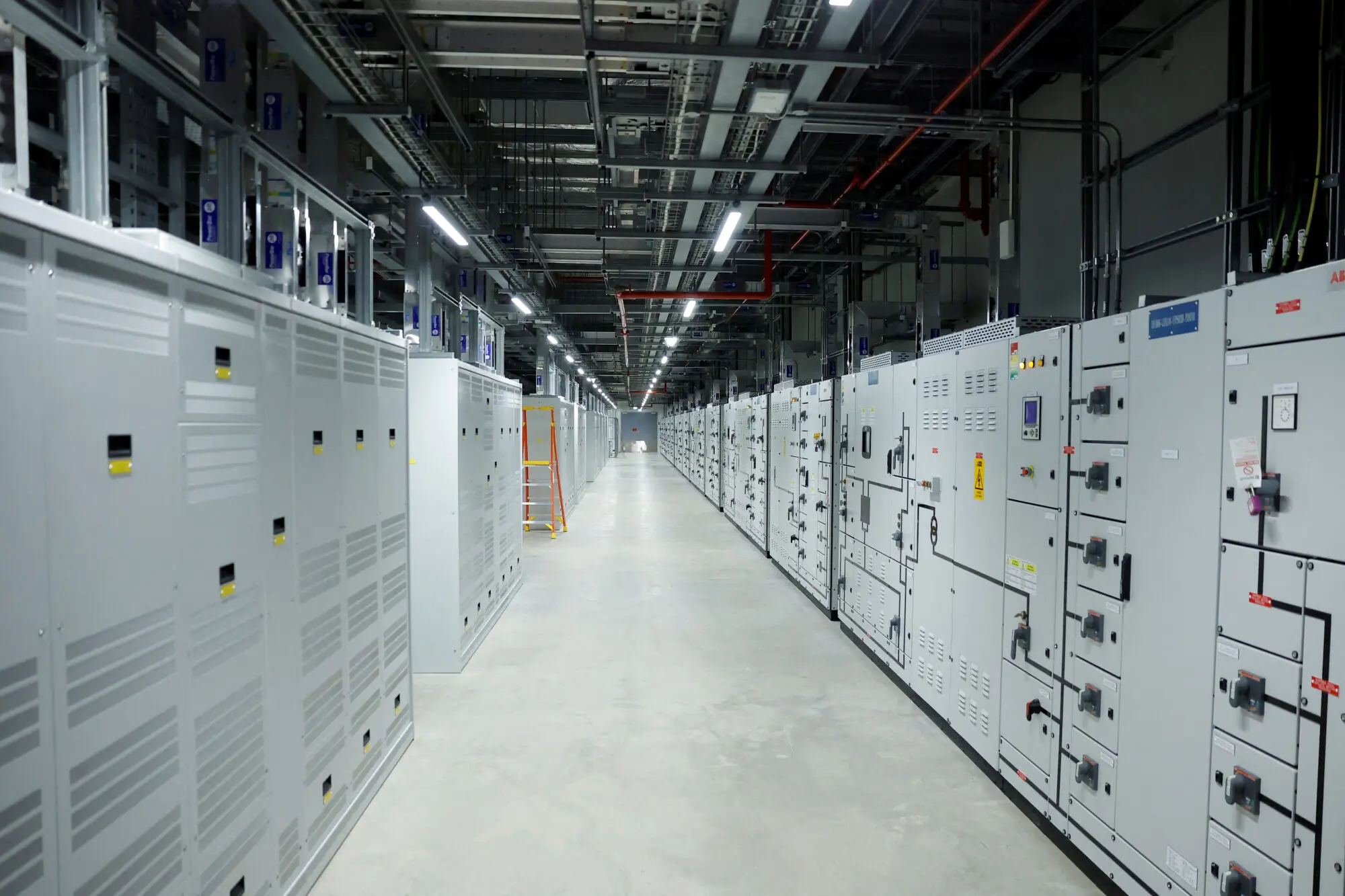A row of machines stands in the electrical room that distributes the electricity to the data hall in the Microsoft data centre during an announcement on its global energy strategy, regarding how it procures and manages energy to scale AI and digital infrastructure sustainably, in Dublin, Ireland. -- Reuters file