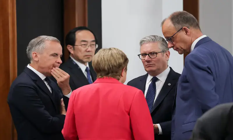 Managing Director of the International Monetary Fund (IMF) Kristalina Georgieva, British Prime Minister Keir Starmer, Canadian Prime Minister Mark Carney and German Chancellor Friedrich Merz talk as they arrive for a working session with G7 leaders and outreach partners on promoting economic growth, during the G7 Summit in Evian-les-Bains, France. -- Reuters