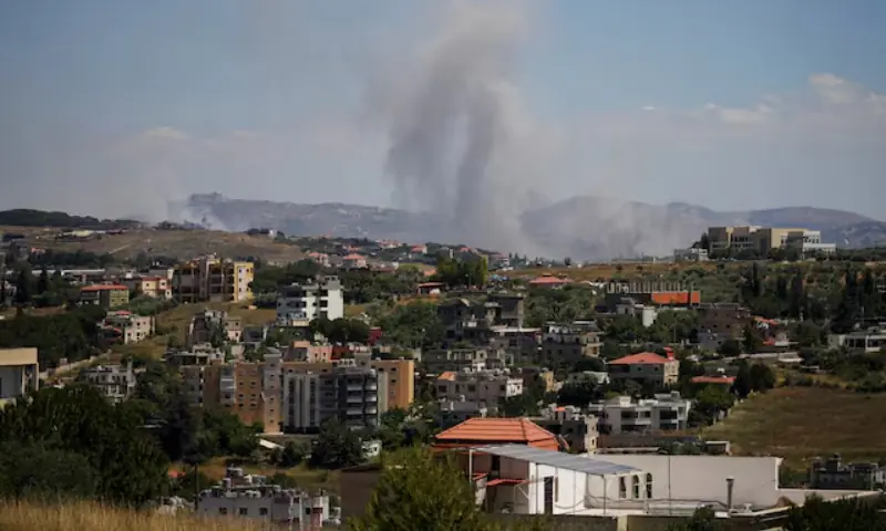 Smoke billows from southern Lebanon following an Israeli strike, as seen from Kfartibnit, Lebanon. -- Reuters