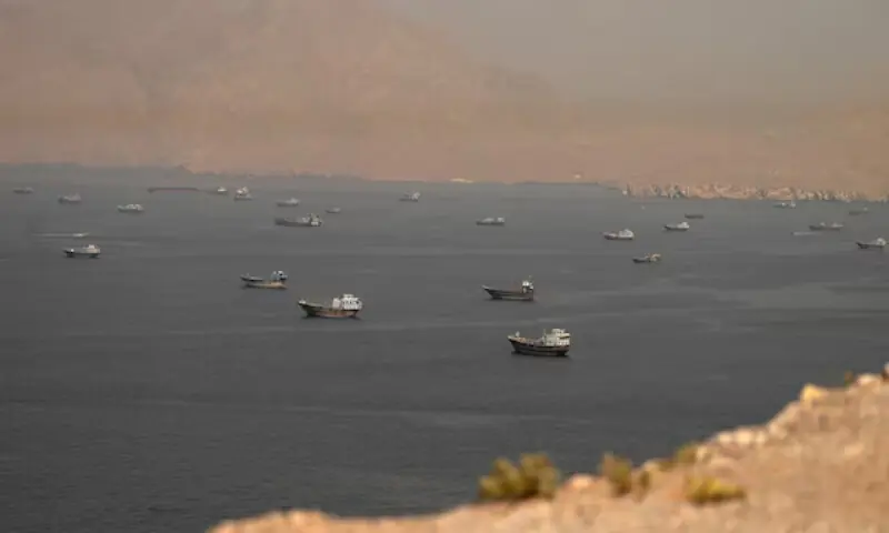 Vessels at the Strait of Hormuz, as seen from Musandam, Oman, on June 18, 2026. Reuters file
