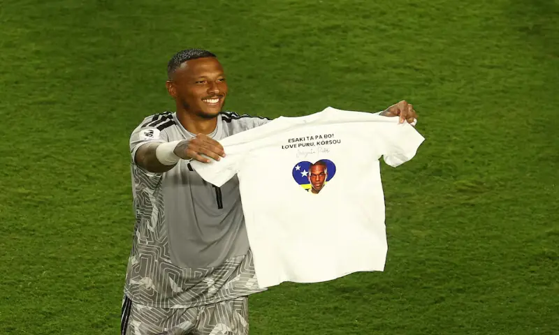 Curacao's Eloy Room celebrates while holding up a t-shirt after the World Cup match against Ecuador in Kansas City Stadium, Kansas City, Missouri, US. -- Reuters