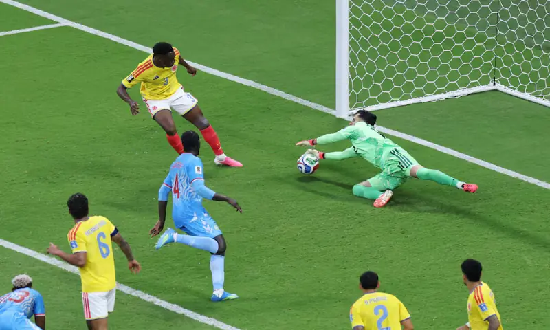 Colombia's Jhon Lucumi and Camilo Vargas in action. -- Reuters