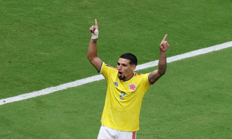 Colombia's Daniel Munoz celebrates scoring their first goal. -- Reuters