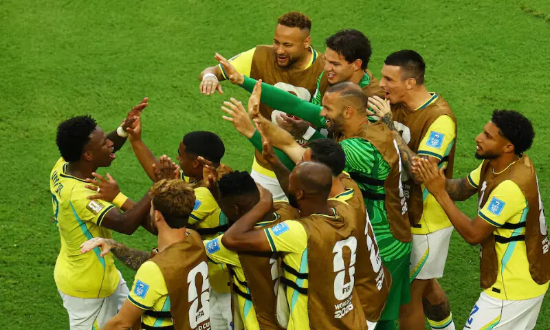 Brazil's Vinicius Junior celebrates scoring second goal with teammates. -- Reuters
