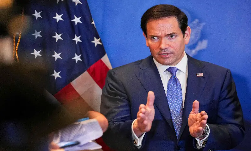 US Secretary of State Marco Rubio speaks with members of the media before departing from Bahrain international airport after his visit to the Middle East to discuss the interim deal between the US and Iran with Arab Gulf allies, in Manama on June 25, 2026. AFP