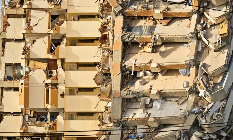 Collapsed buildings in the aftermath of earthquakes in La Guaira, Venezuela. -- Reuters
