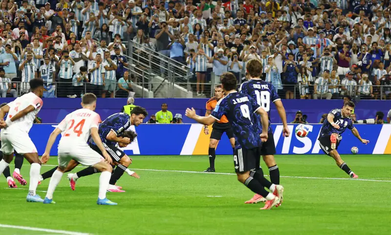 Argentina's Giovani Lo Celso scores their first goal from a free kick. -- Reuters