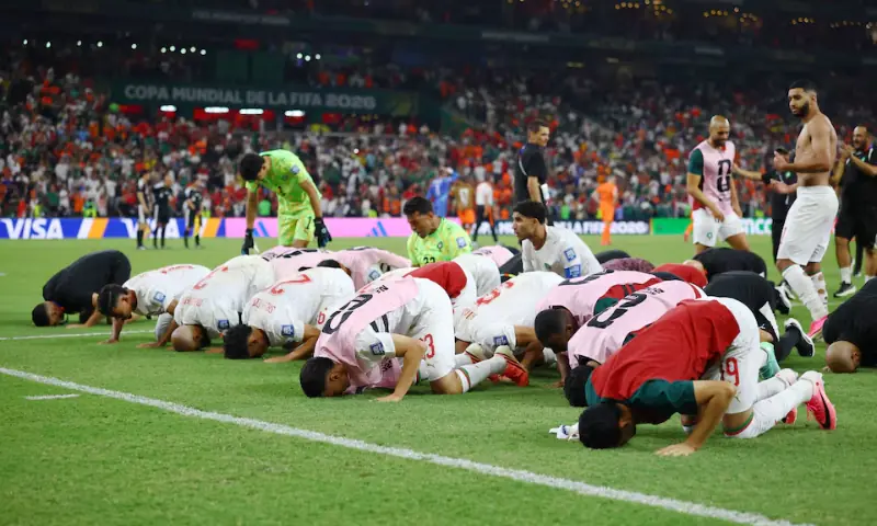 Morocco players celebrate after the penalty shootout as Morocco qualify for the round of 16 stage of the World Cup. -- Reuters