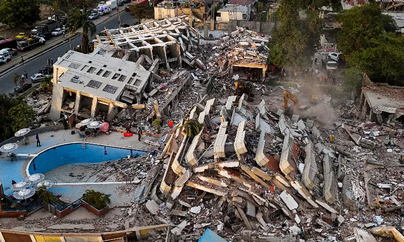 This aerial view shows buildings destroyed following twin earthquakes in Caraballeda, La Guaira State, Venezuela, on June 29, 2026. AFP