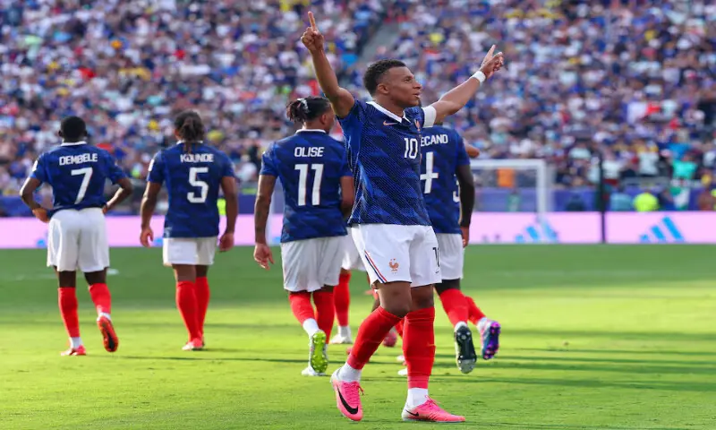 France's Kylian Mbappe celebrates scoring their third goal. -- Reuters
