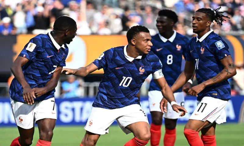 France's Kylian Mbappe celebrates scoring their first goal with Ousmane Dembele and Michael Olise. -- Reuters
