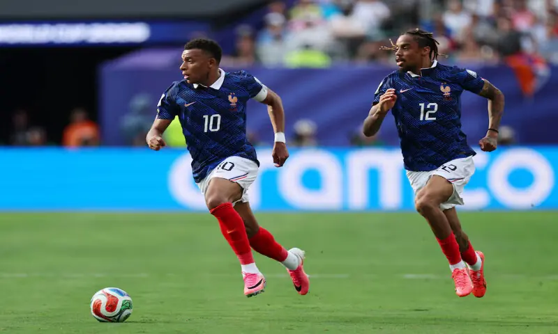 France's Kylian Mbappe and Bradley Barcola in action. -- Reuters