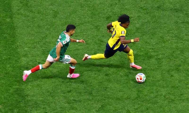 Ecuador's Angelo Preciado in action with Mexico's Orbelin Pineda. -- Reuters